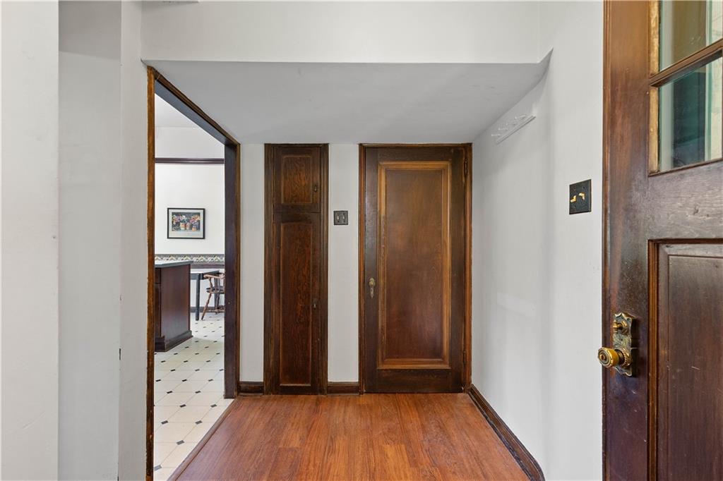 2 Crescent Drive Pittsburgh, PA 15228 - Photo 18 of 48 a view of a hallway with wooden floor and closet