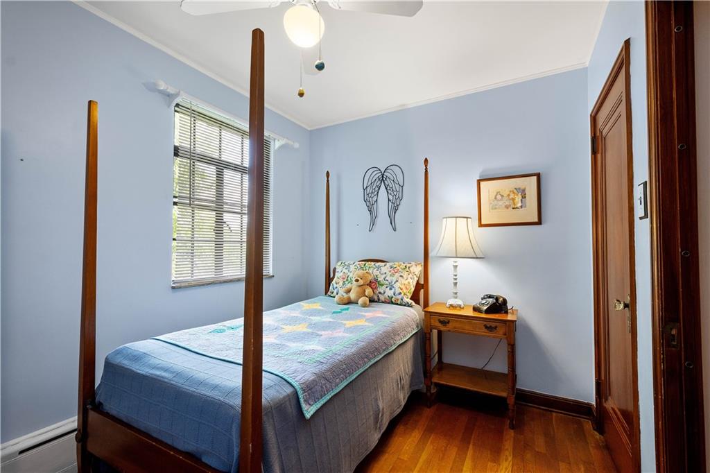 2 Crescent Drive Pittsburgh, PA 15228 - Photo 29 of 48 a bedroom with a bed and wooden floor