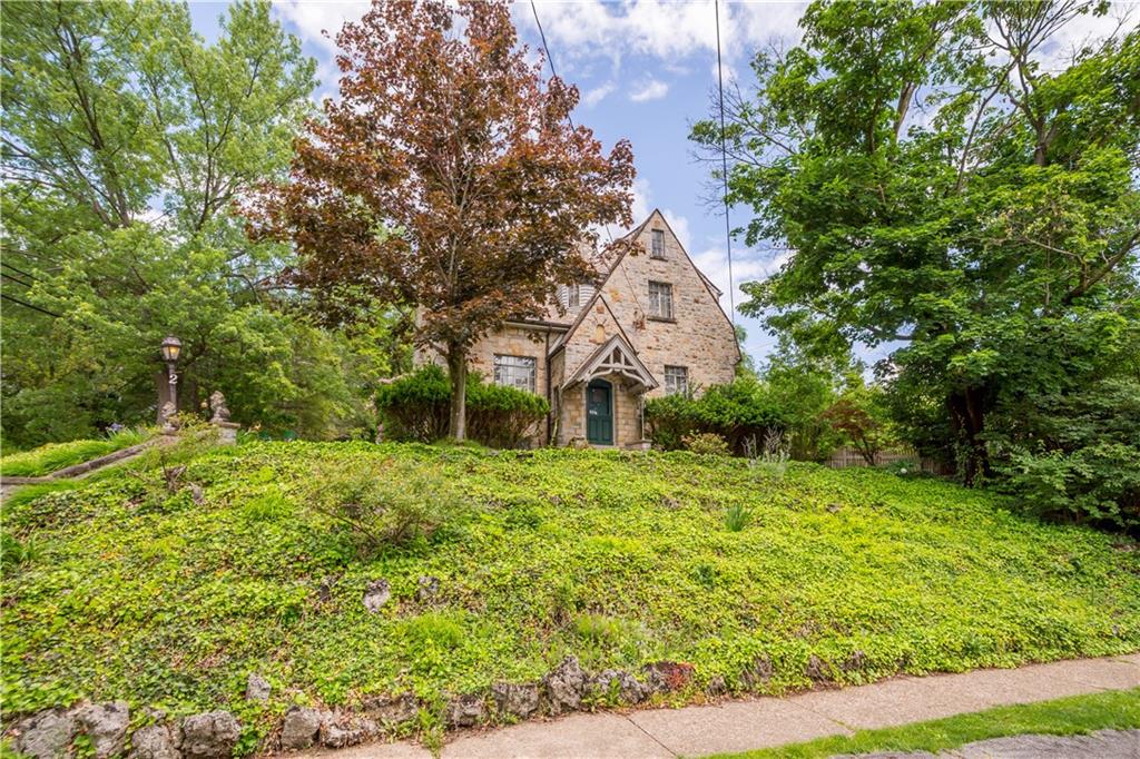 2 Crescent Drive Pittsburgh, PA 15228 - Photo 38 of 48 a yellow building with trees in the background