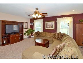 171 Vision Road Canton, NC 28716 - Photo 3 of 17 a living room with furniture and a flat screen tv