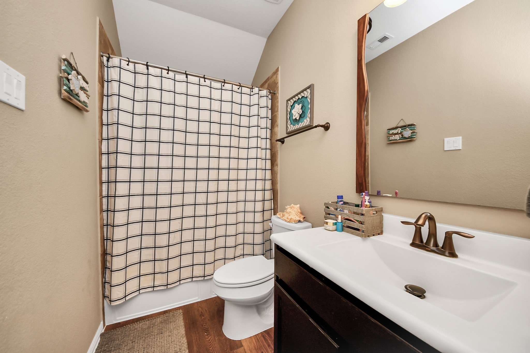 7502 Simpson Springs Lane Spring, TX 77389 - Photo 13 of 38 a bathroom with a sink a toilet and shower
