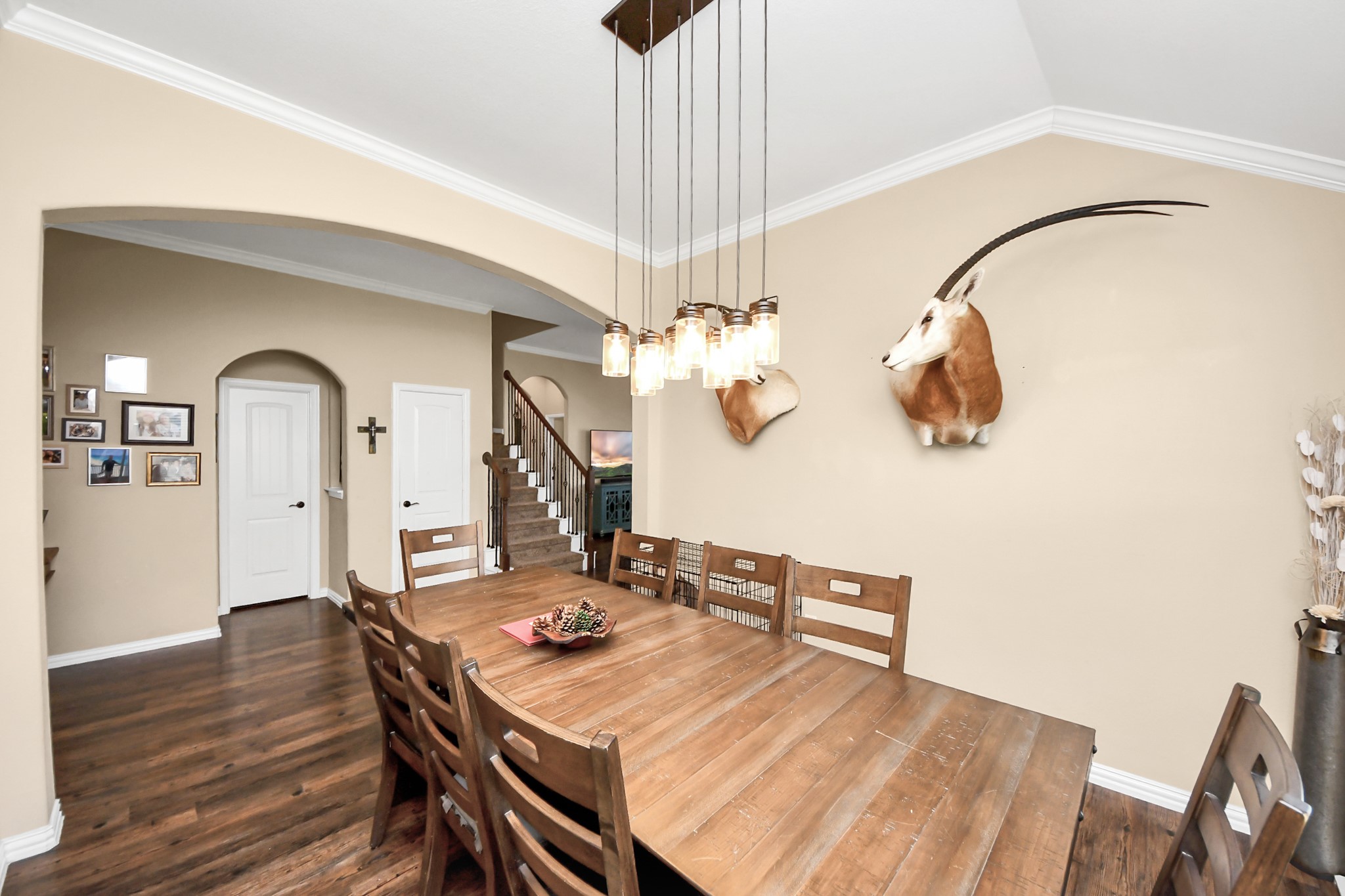 7502 Simpson Springs Lane Spring, TX 77389 - Photo 16 of 38 a view of a dining room with furniture and a chandelier