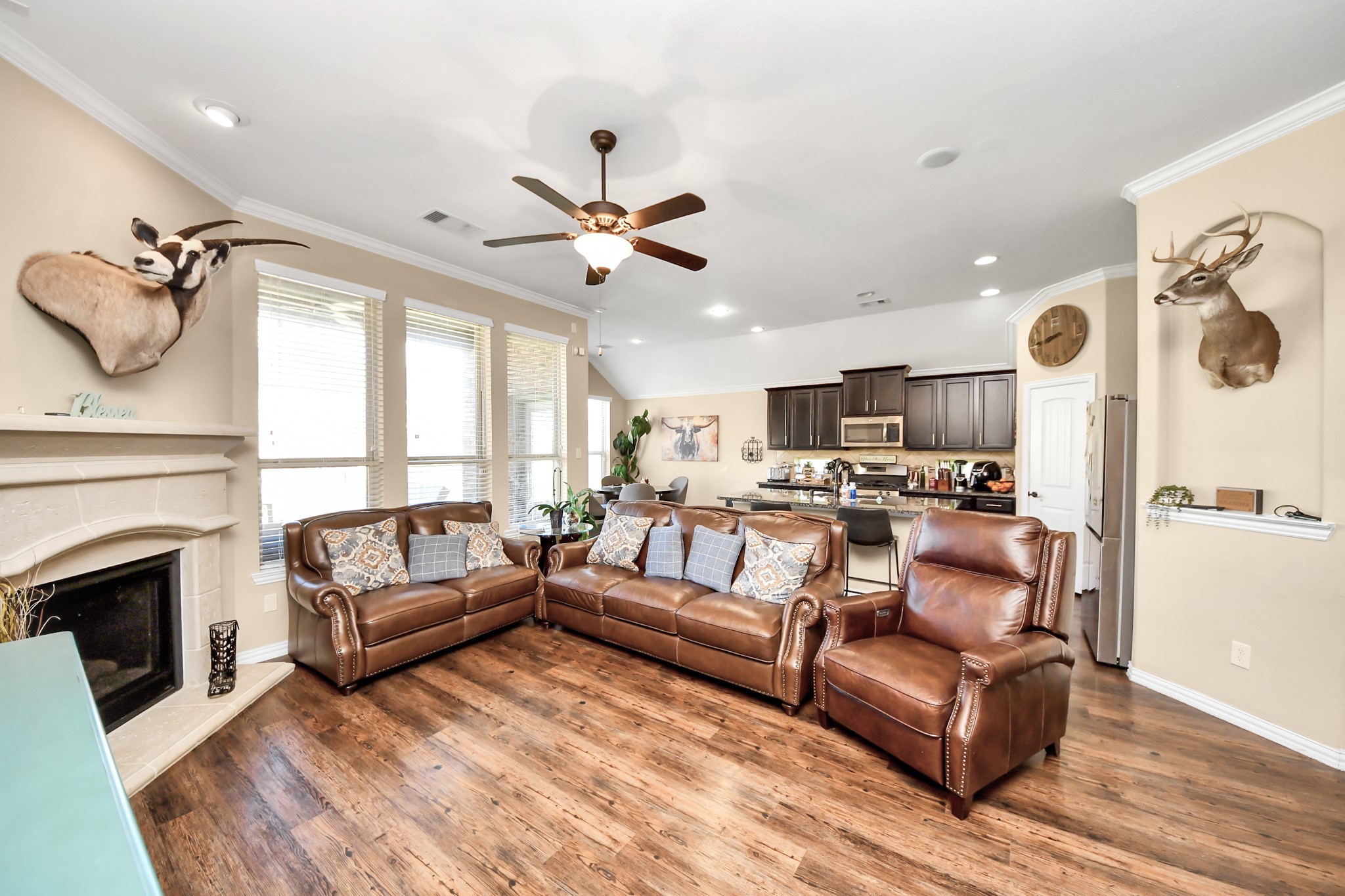 7502 Simpson Springs Lane Spring, TX 77389 - Photo 20 of 38 a view of living room kitchen with furniture and a fireplace