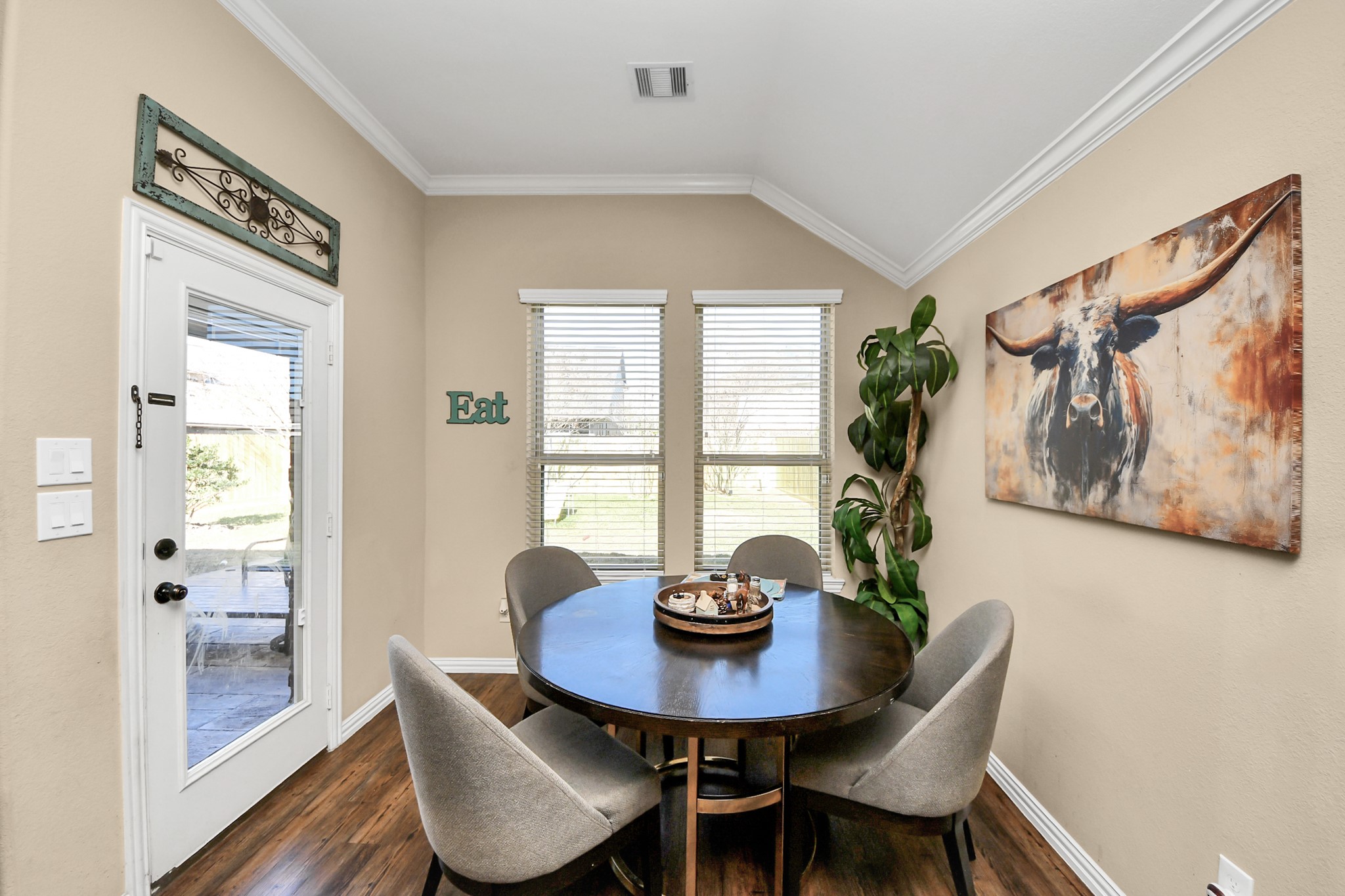 7502 Simpson Springs Lane Spring, TX 77389 - Photo 29 of 38 a view of a dining room with furniture window and wooden floor