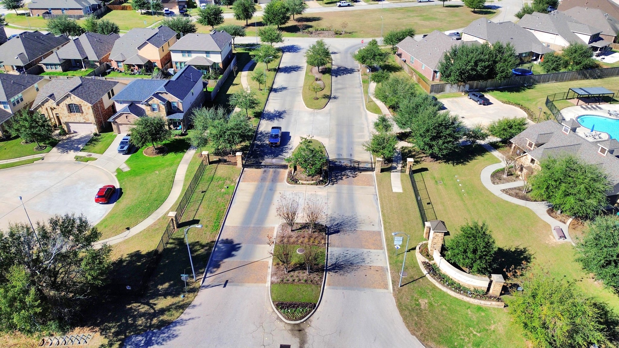 7502 Simpson Springs Lane Spring, TX 77389 - Photo 3 of 38 an aerial view of residential house with outdoor space and swimming pool