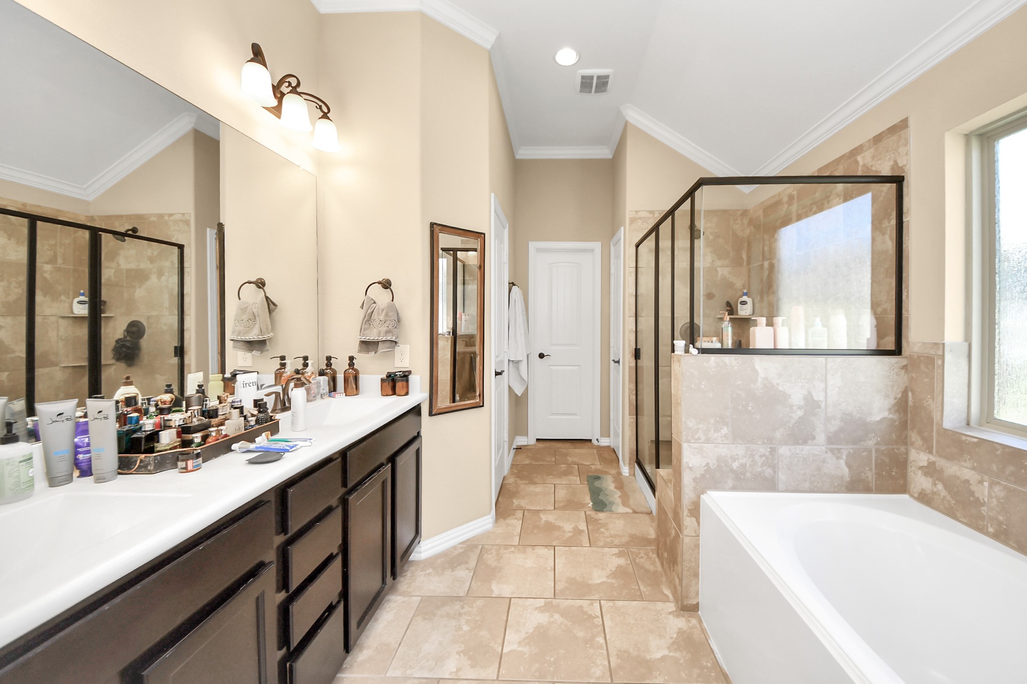 7502 Simpson Springs Lane Spring, TX 77389 - Photo 33 of 38 a large spacious bathroom with a large tub and shower