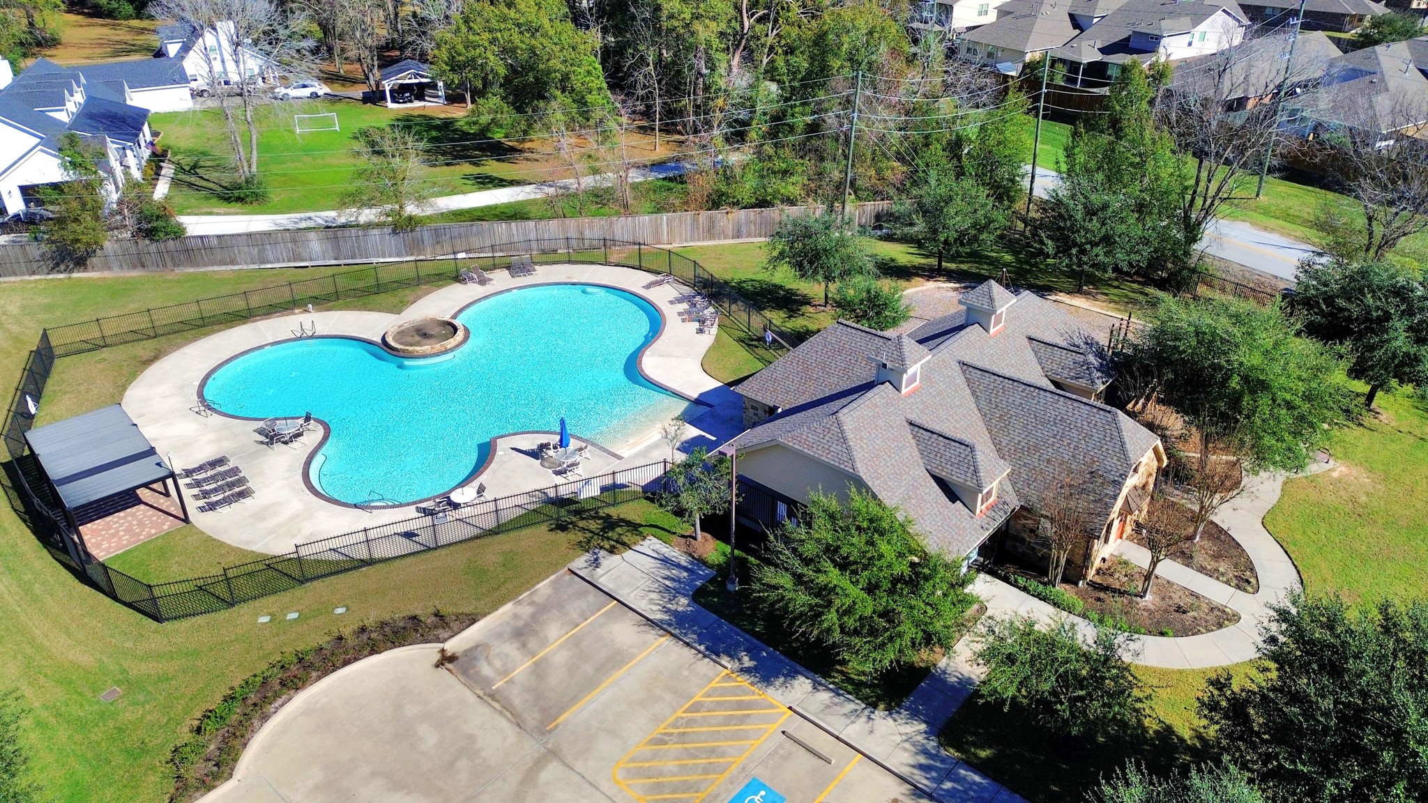 7502 Simpson Springs Lane Spring, TX 77389 - Photo 4 of 38 an aerial view of a swimming pool and outdoor space