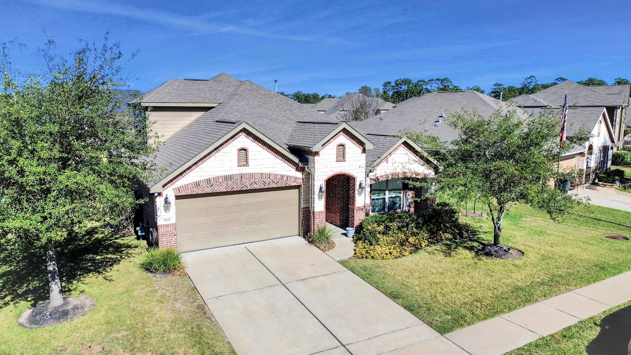 7502 Simpson Springs Lane Spring, TX 77389 - Photo 5 of 38 a view of a house with a yard and potted plants