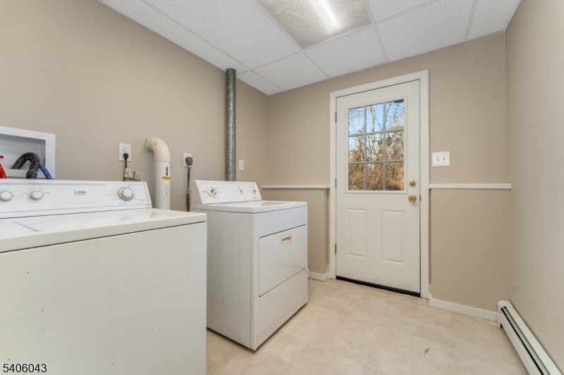 333 Mt Bethel Road Port Murray, NJ 07865 - Photo 19 of 47 a utility room with dryer and washer