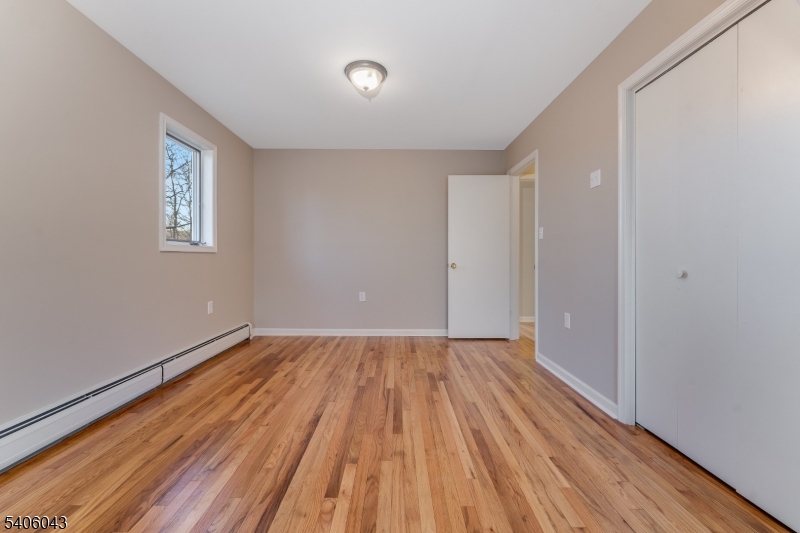 333 Mt Bethel Road Port Murray, NJ 07865 - Photo 30 of 47 a view of an empty room with wooden floor