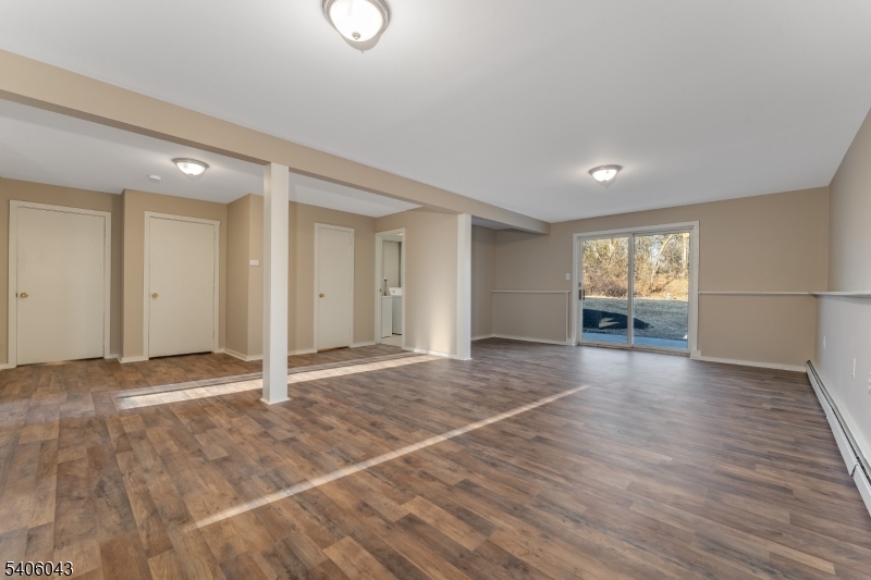 333 Mt Bethel Road Port Murray, NJ 07865 - Photo 34 of 47 a view of an empty room with window and wooden floor