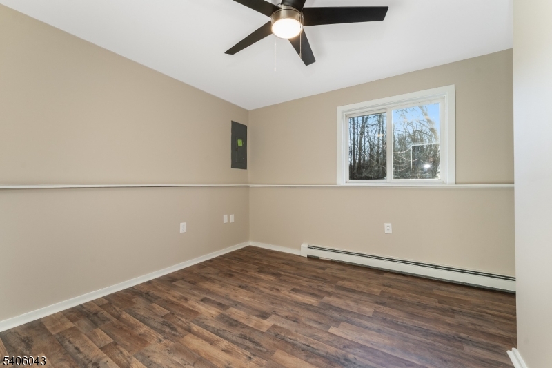333 Mt Bethel Road Port Murray, NJ 07865 - Photo 37 of 47 a view of a big room with wooden floor and windows