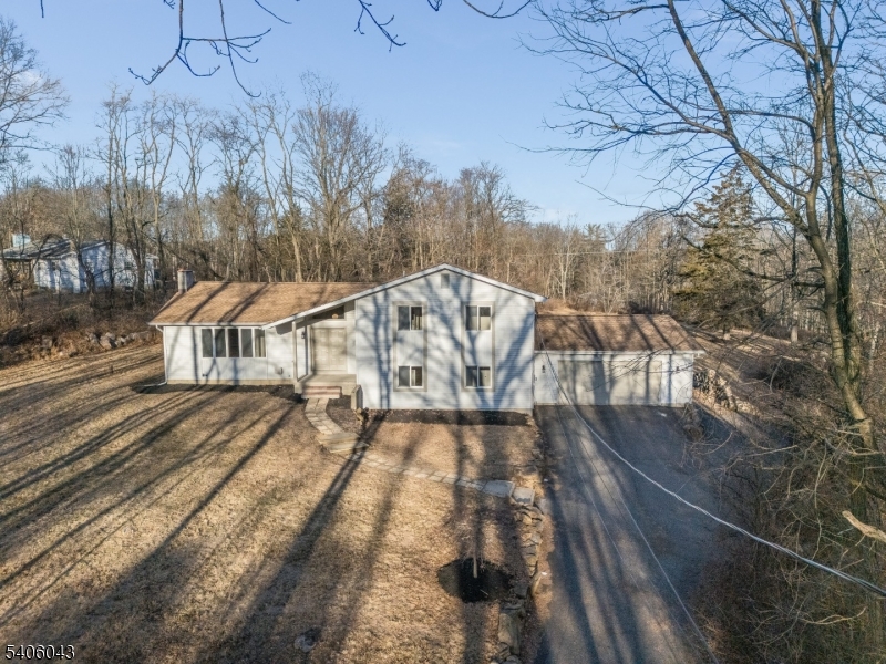 333 Mt Bethel Road Port Murray, NJ 07865 - Photo 43 of 47 a view of a house with backyard and trees