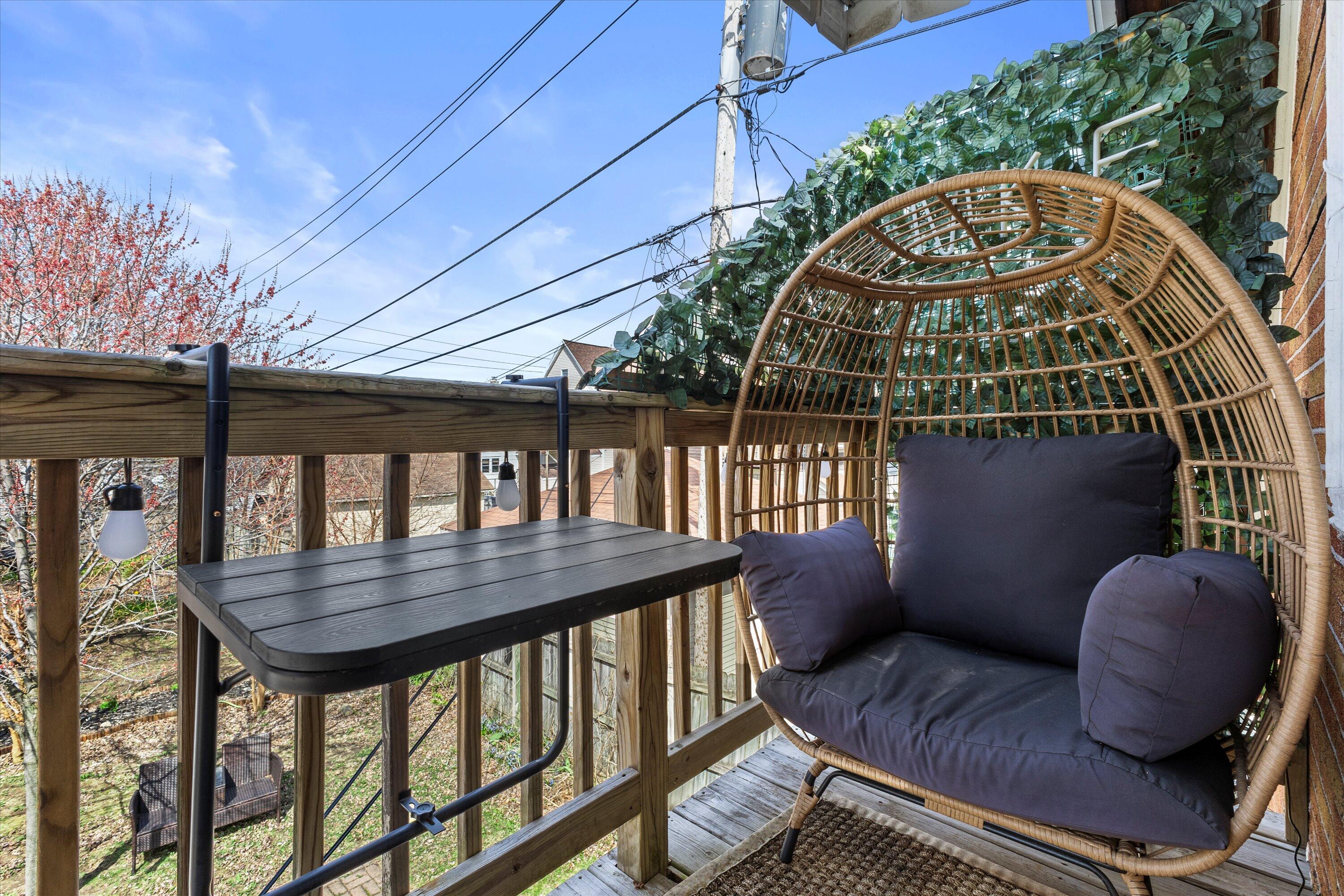 159 North 59th Street Milwaukee, WI 53213 - Photo 4 of 34 Private balcony with cozy seating — your morning coffee spot