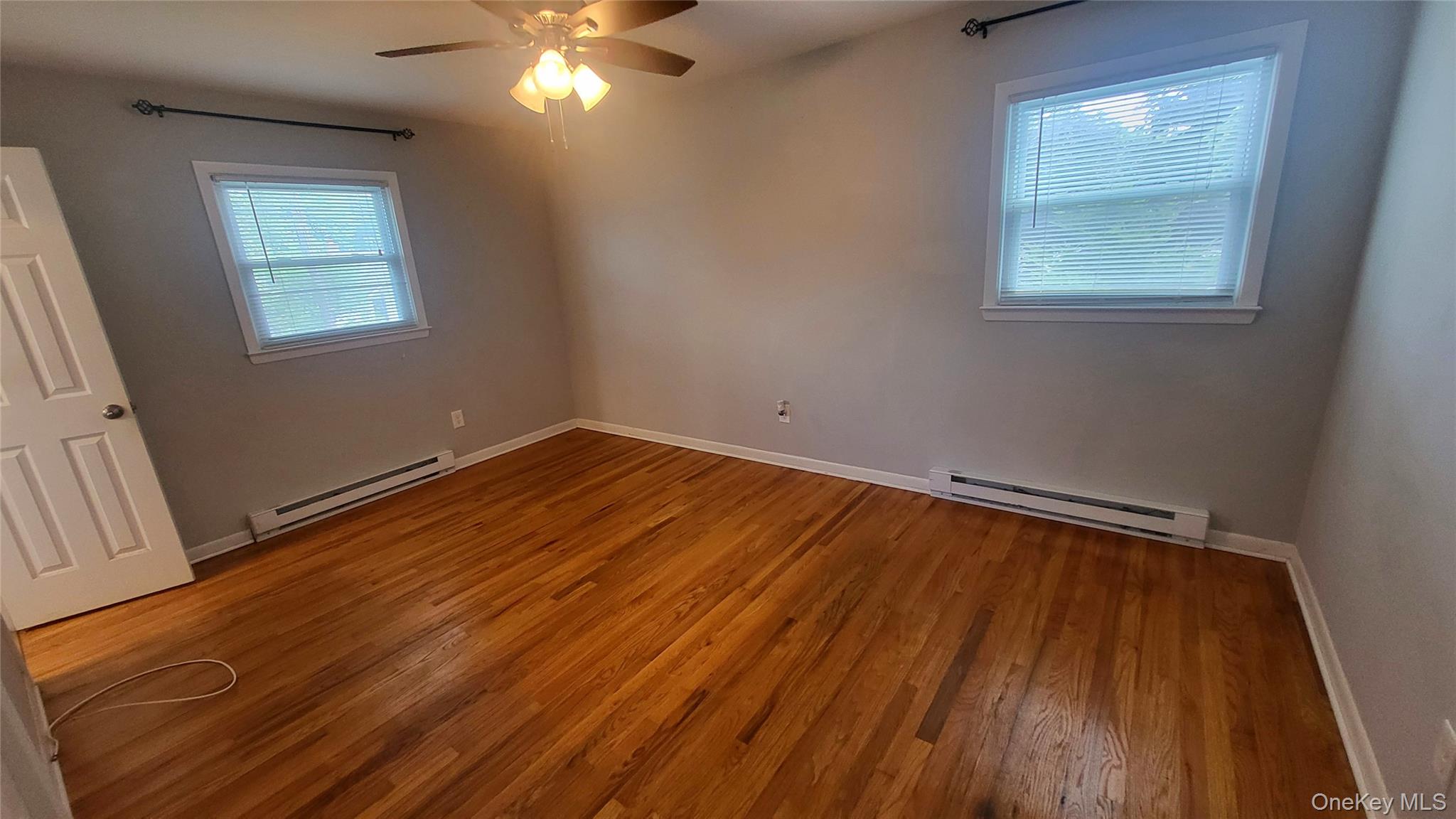 12 High Ridge Road Poughkeepsie, NY 12603 - Photo 22 of 34 Primary bedroom with ceiling fan
