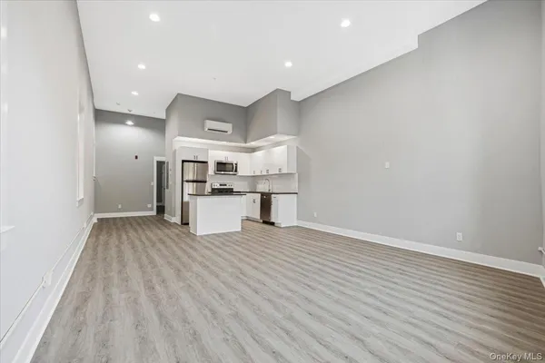 a view of kitchen with wooden floor