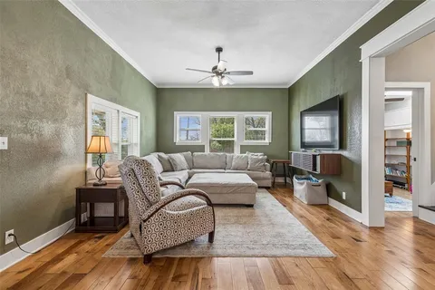 a living room with furniture or couch and a window