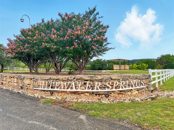 a view of park with sign board