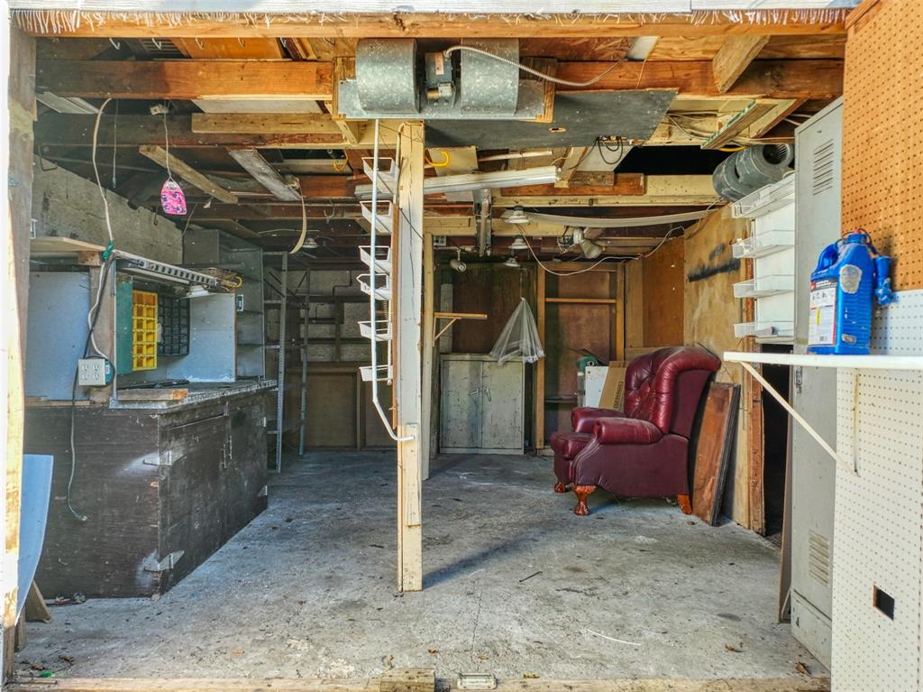 2222 Houston Street Grand Prairie, TX 75050 - Photo 23 of 24 a view of a room with storage and utility