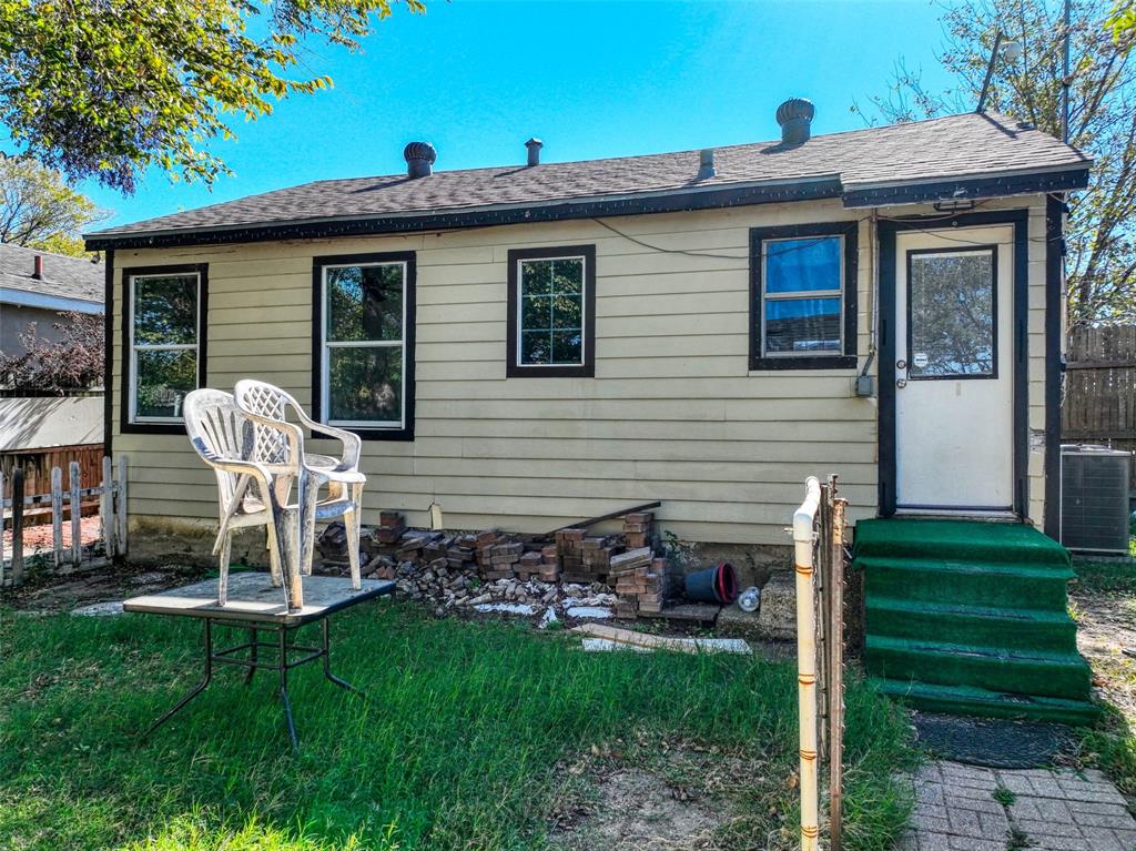 2222 Houston Street Grand Prairie, TX 75050 - Photo 24 of 24 a view of a house with backyard