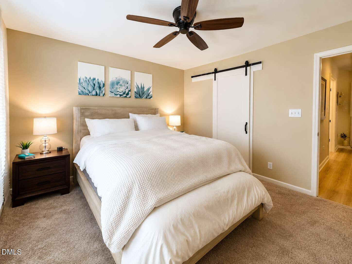 120 Student Place Durham, NC 27713 - Photo 8 of 15 a bedroom with a bed and a chandelier