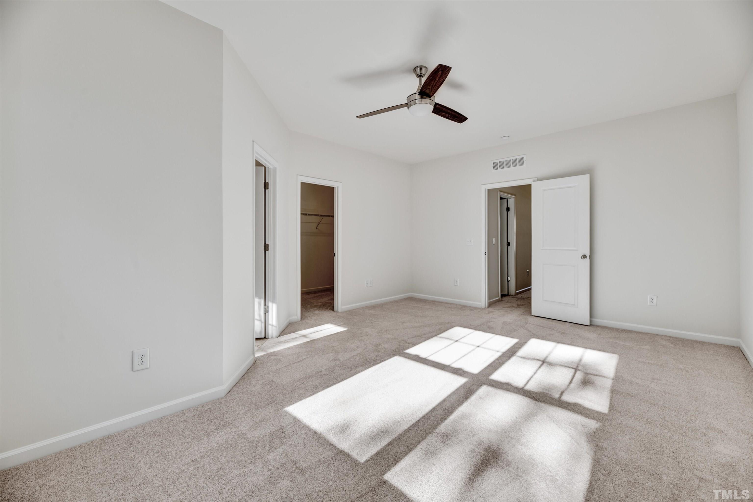 714 Treviso Lane Apex, NC 27502 - Photo 29 of 41 a view of an empty room and window
