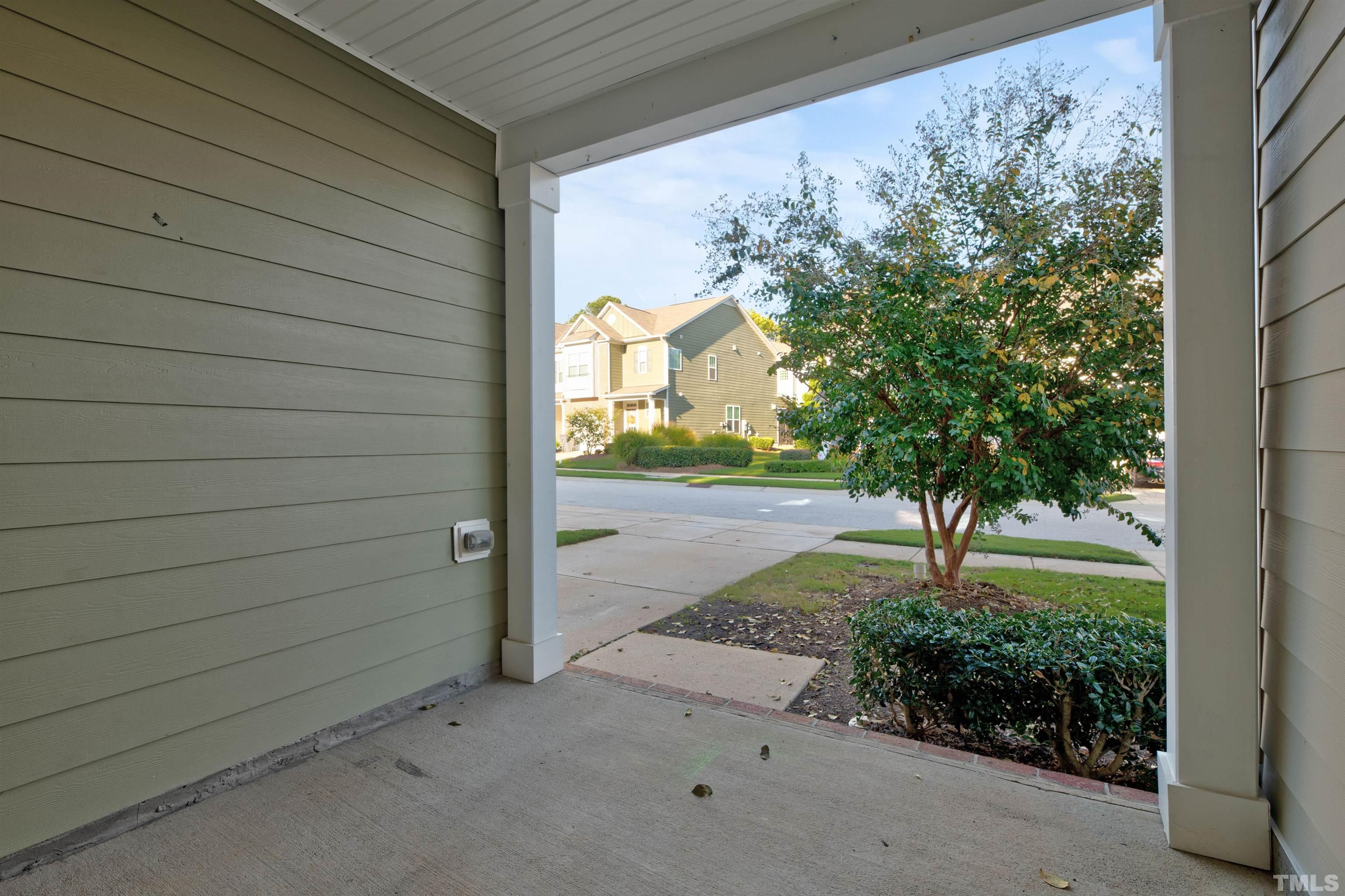 714 Treviso Lane Apex, NC 27502 - Photo 3 of 41 a view of a entrance gate of the house
