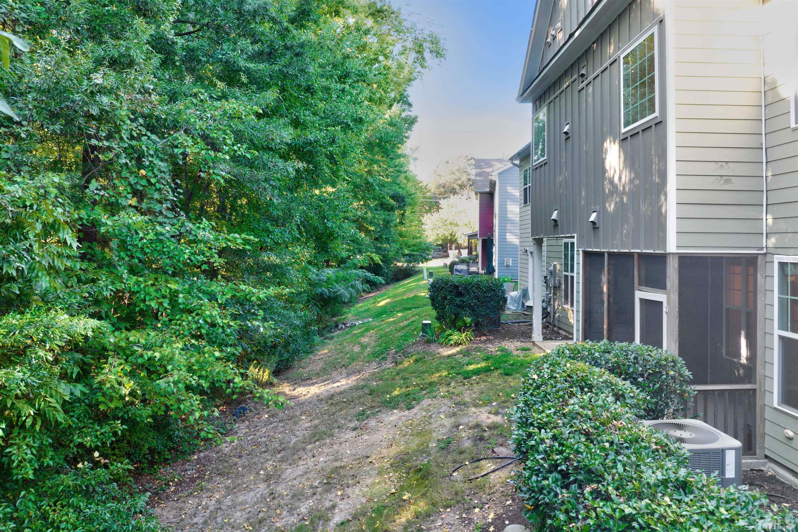 714 Treviso Lane Apex, NC 27502 - Photo 35 of 41 a view of a pathway both side of house
