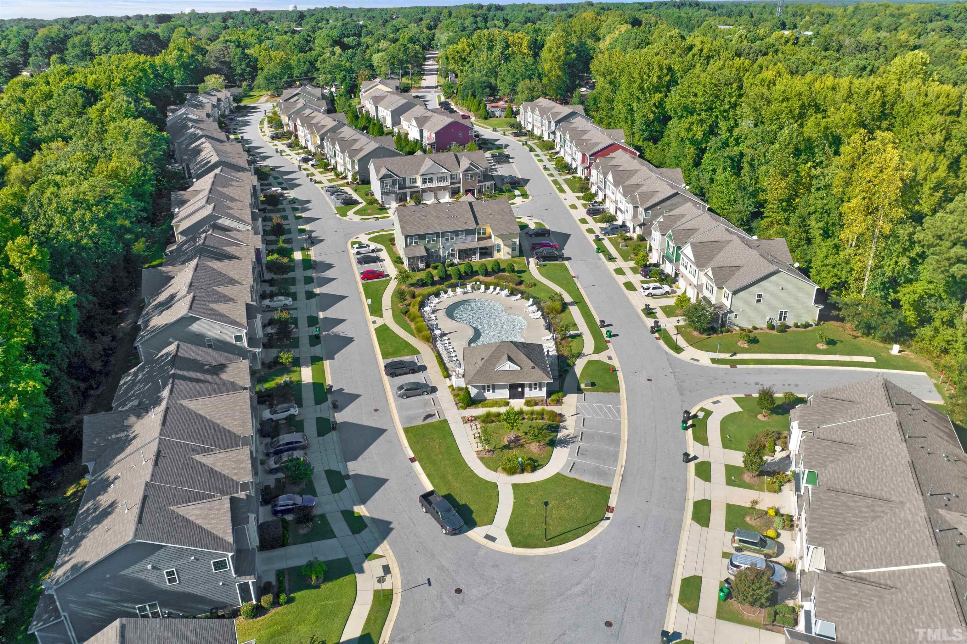 714 Treviso Lane Apex, NC 27502 - Photo 40 of 41 an aerial view of residential house with outdoor space and swimming pool