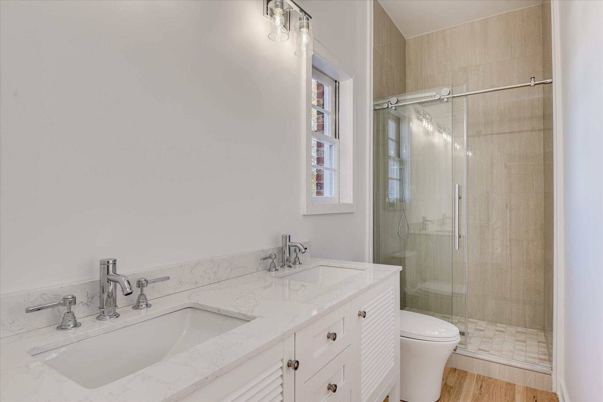 126 Mosley Road Aiken, SC 29801 - Photo 20 of 29 a bathroom with a sink and a mirror