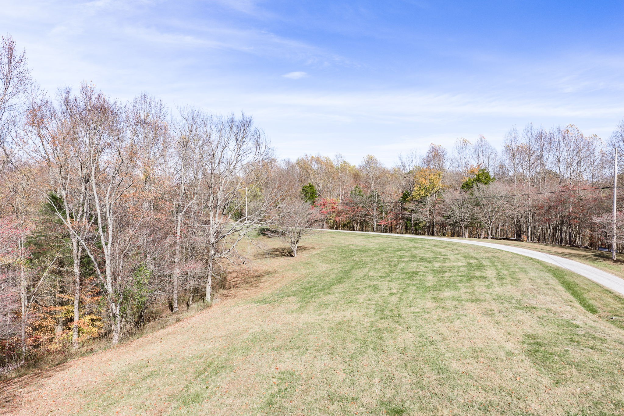 0 Austin Ridge Road Baxter, TN 38544 - Photo 3 of 20 a view of a yard with trees in front of the house