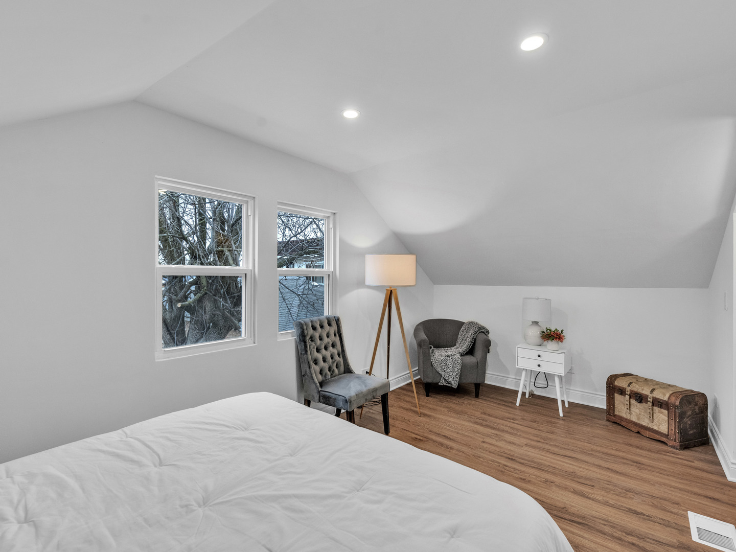 2343 Ridgeland Avenue Berwyn, IL 60402 - Photo 25 of 30 a bedroom with a bed and wooden floor