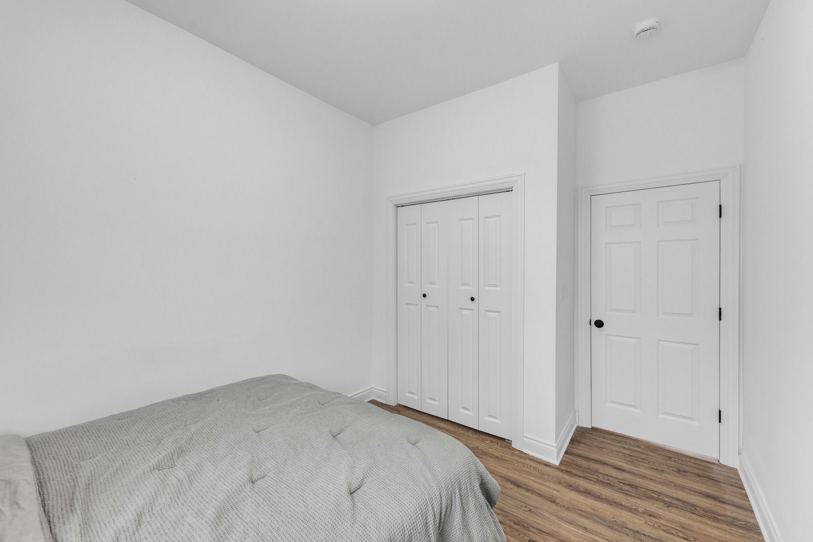 2343 Ridgeland Avenue Berwyn, IL 60402 - Photo 28 of 30 a view of a bedroom with wooden floor and closet