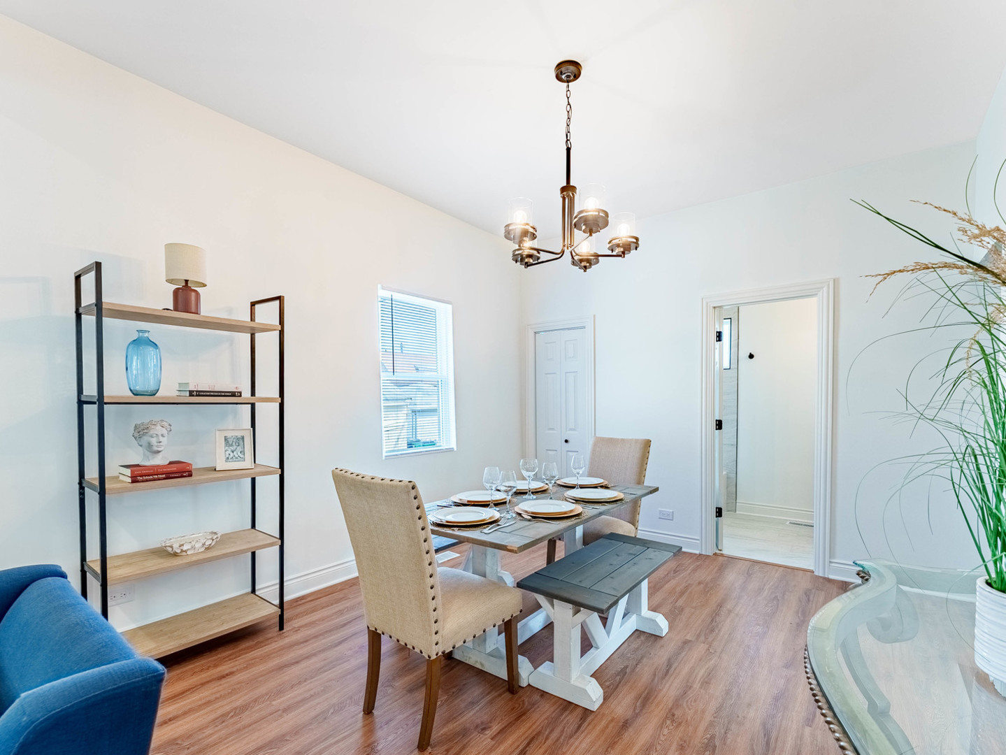 2343 Ridgeland Avenue Berwyn, IL 60402 - Photo 8 of 30 a view of a dining room with furniture a chandelier and wooden floor