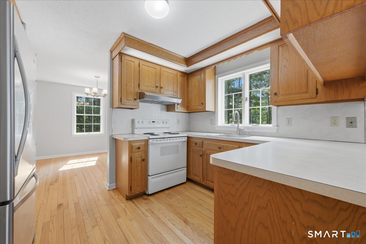 3 Docs Hill Rd. Westbrook, CT 06498 - Photo 7 of 37 Kitchen with hardwood floors