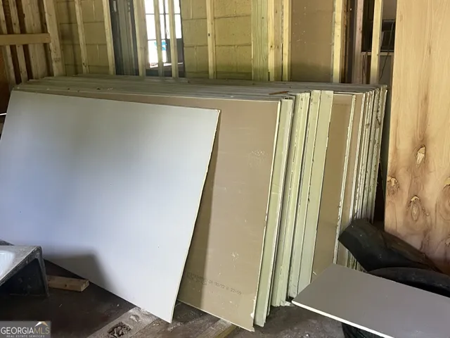 a view of a balcony with chairs