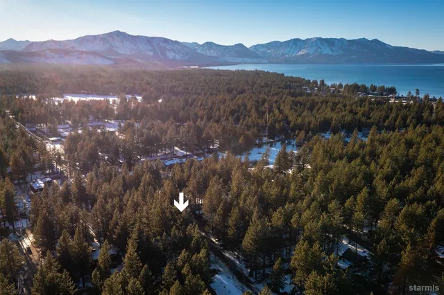 a view of swimming pool with outdoor seating and yard