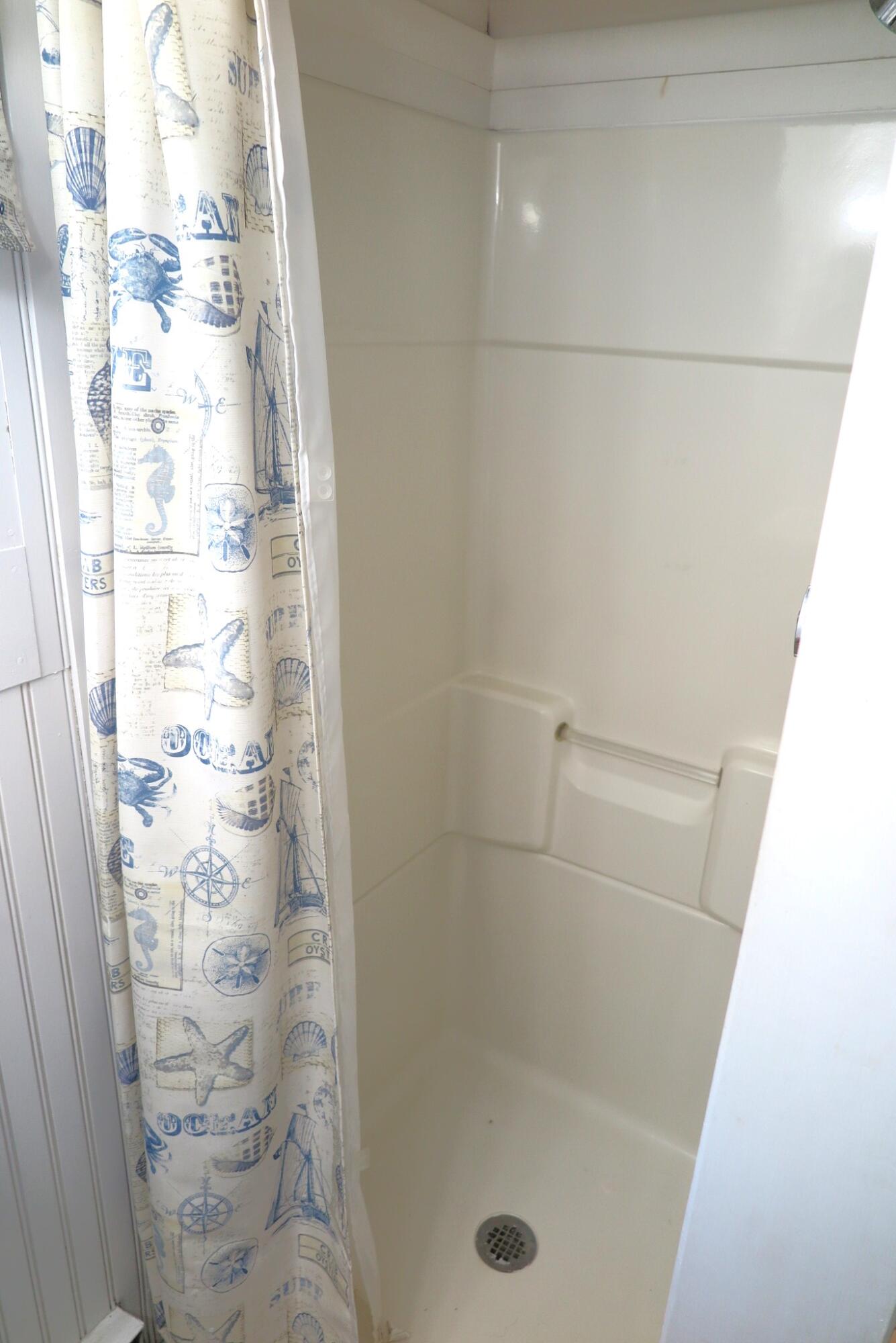 50 Lower County Road Dennis Port, MA 02639 - Photo 10 of 28 a bathroom with a shower