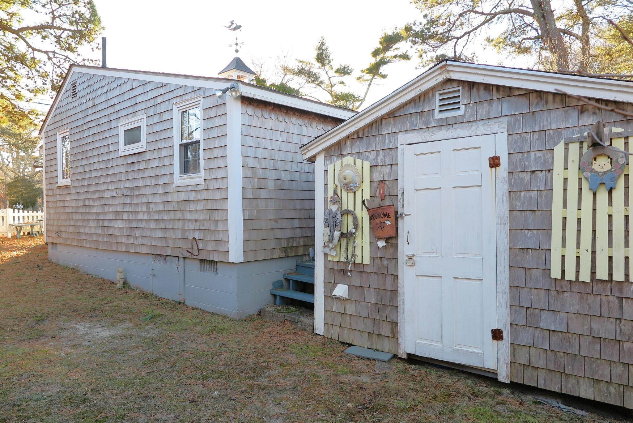 50 Lower County Road Dennis Port, MA 02639 - Photo 22 of 28 a view of a small house