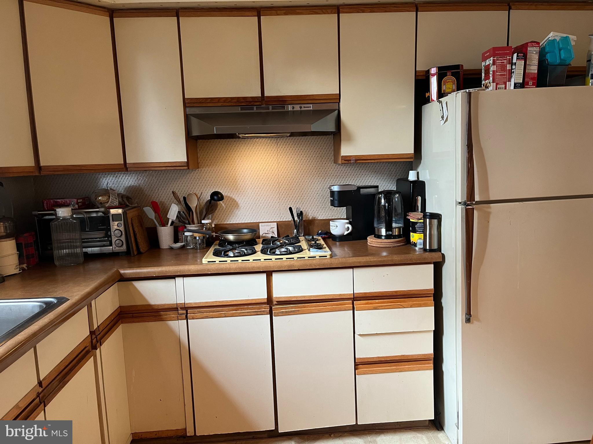 9609 Clark Street Philadelphia, PA 19115 - Photo 14 of 46 a kitchen with appliances cabinets and a counter top