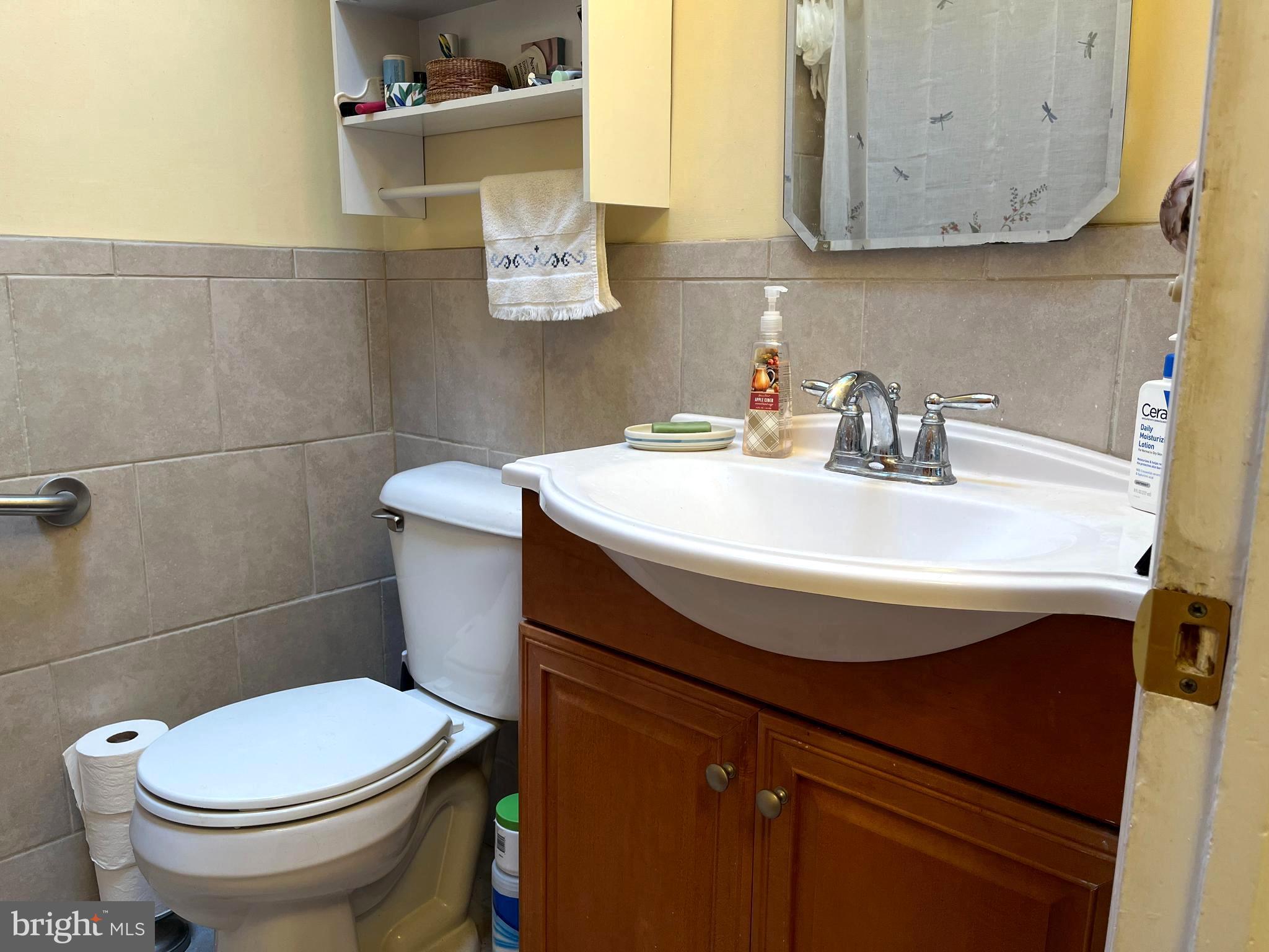 9609 Clark Street Philadelphia, PA 19115 - Photo 18 of 46 a bathroom with a sink and a toilet