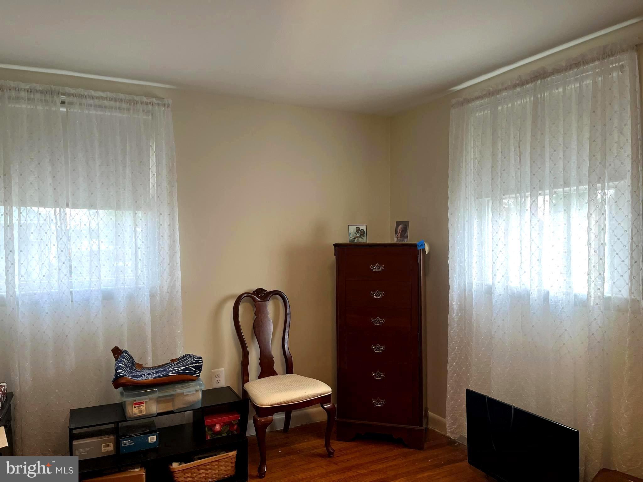 9609 Clark Street Philadelphia, PA 19115 - Photo 25 of 46 a living room with furniture and a window