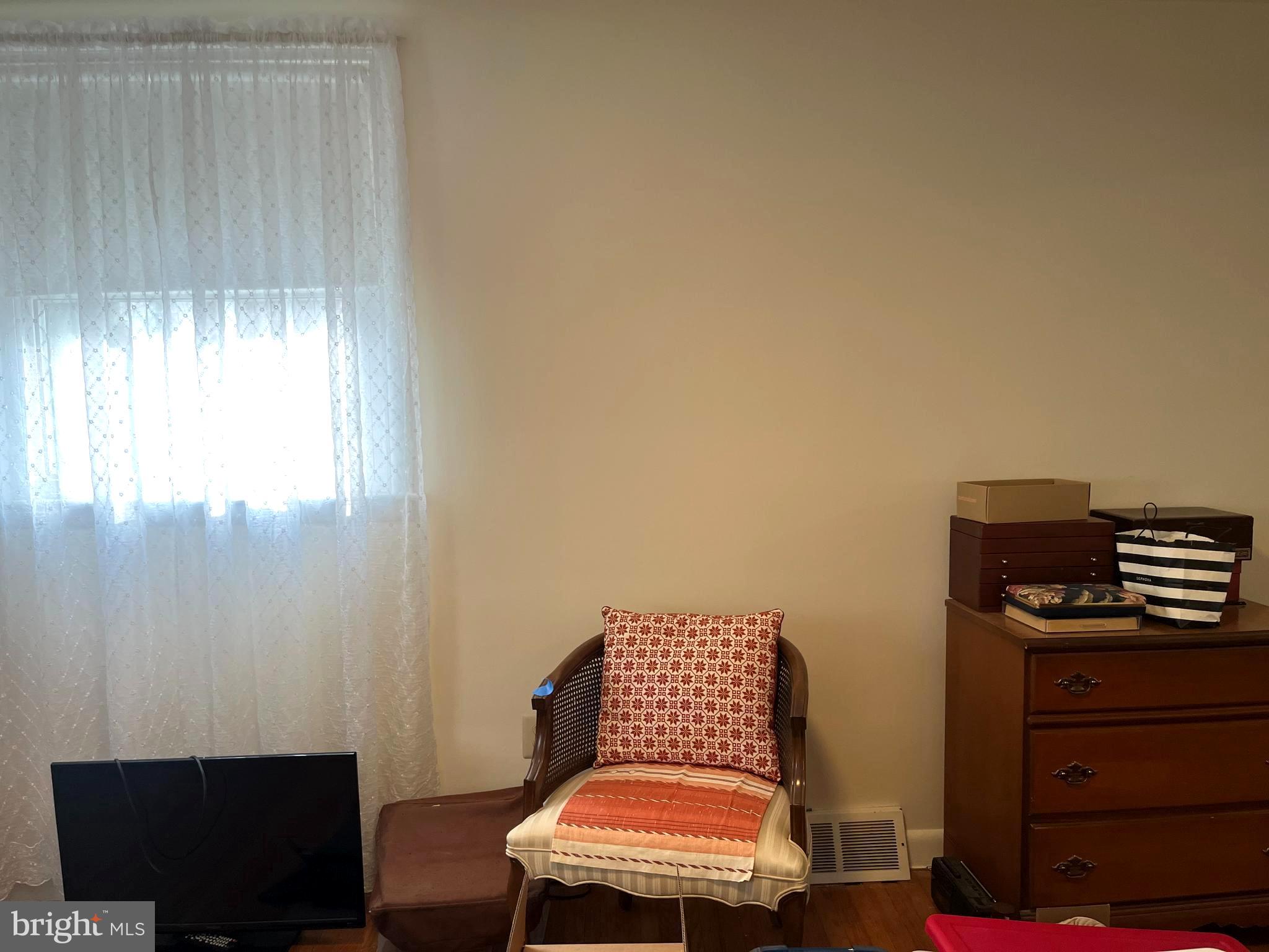 9609 Clark Street Philadelphia, PA 19115 - Photo 27 of 46 a room with furniture and a window