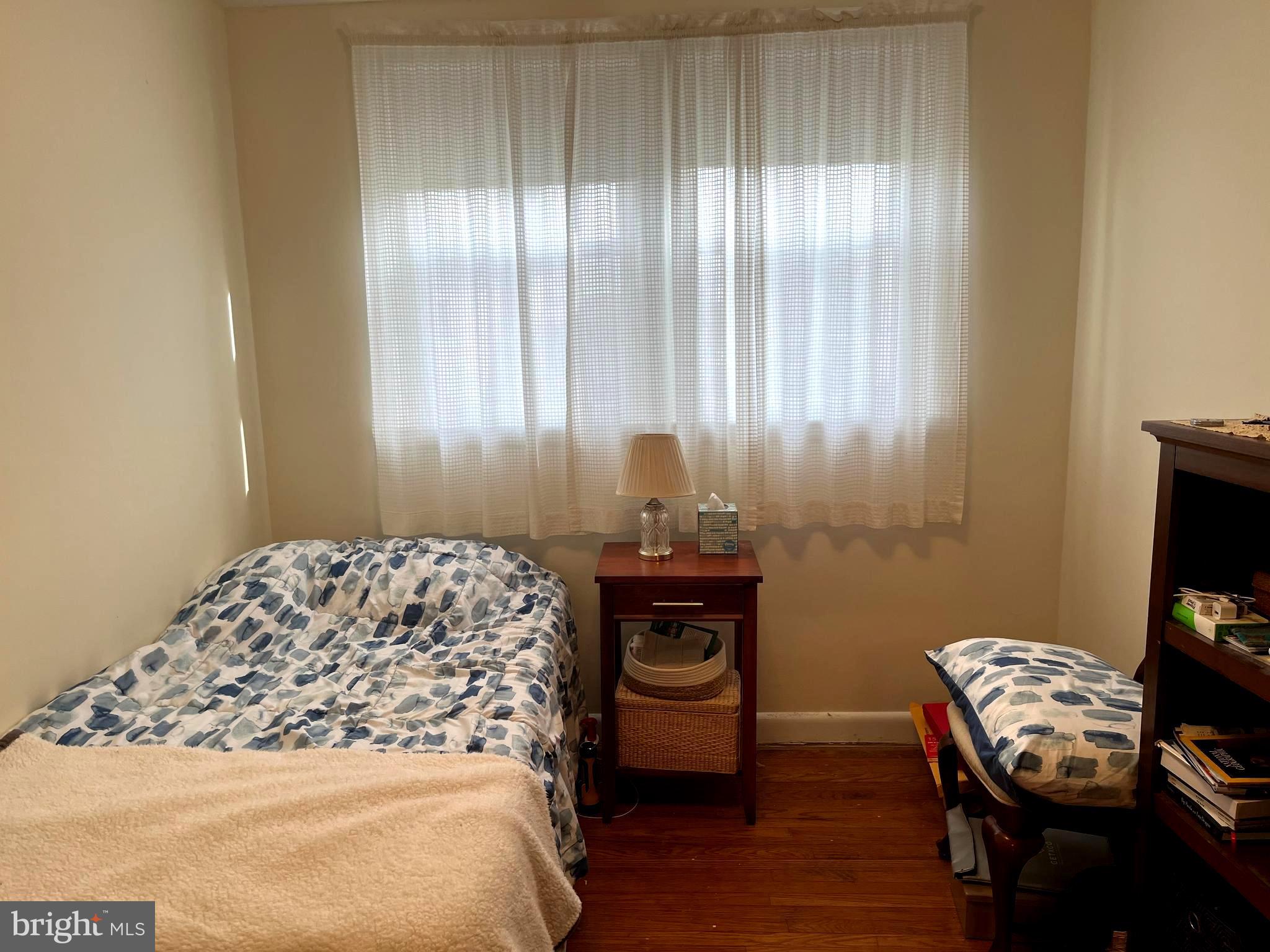 9609 Clark Street Philadelphia, PA 19115 - Photo 28 of 46 a bedroom with a bed and a tv