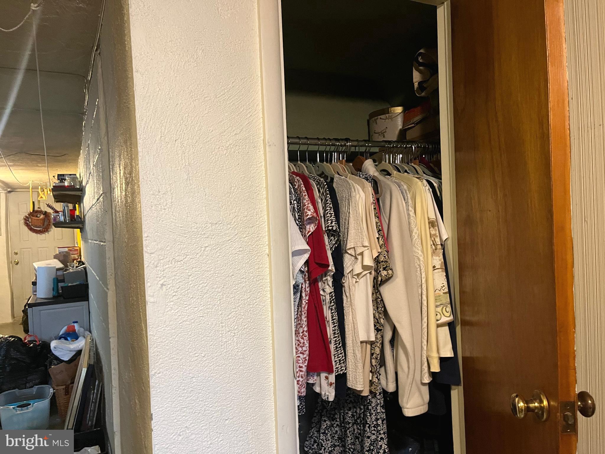 9609 Clark Street Philadelphia, PA 19115 - Photo 38 of 46 a view of walk in closet with clothes and shoes