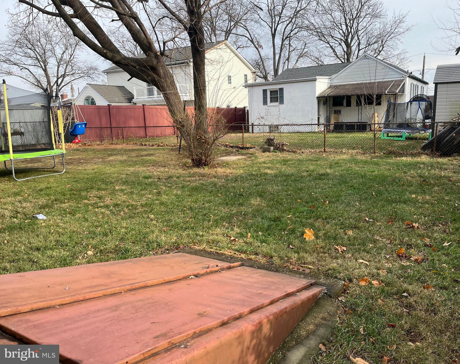 9609 Clark Street Philadelphia, PA 19115 - Photo 4 of 46 a view of a house with a yard
