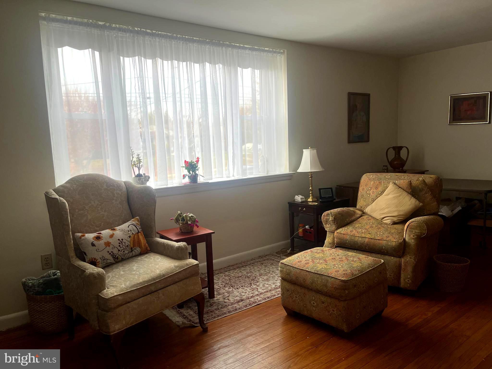 9609 Clark Street Philadelphia, PA 19115 - Photo 8 of 46 a living room with furniture and a window