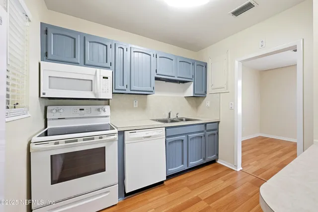 a view of kitchen island wooden floor