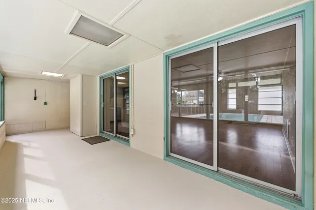 a view of livingroom with hallway