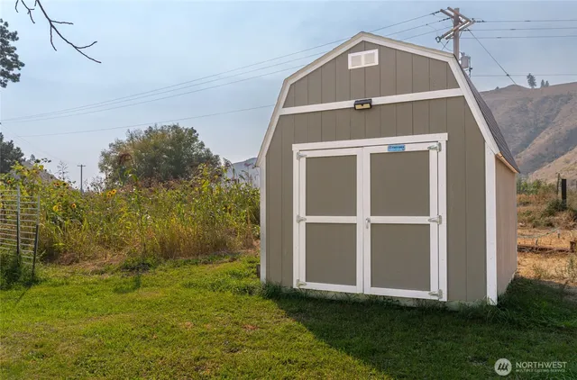 a view of a road next to a building